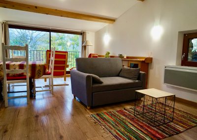 Séjour avec coin salon - Gîte Le Loft